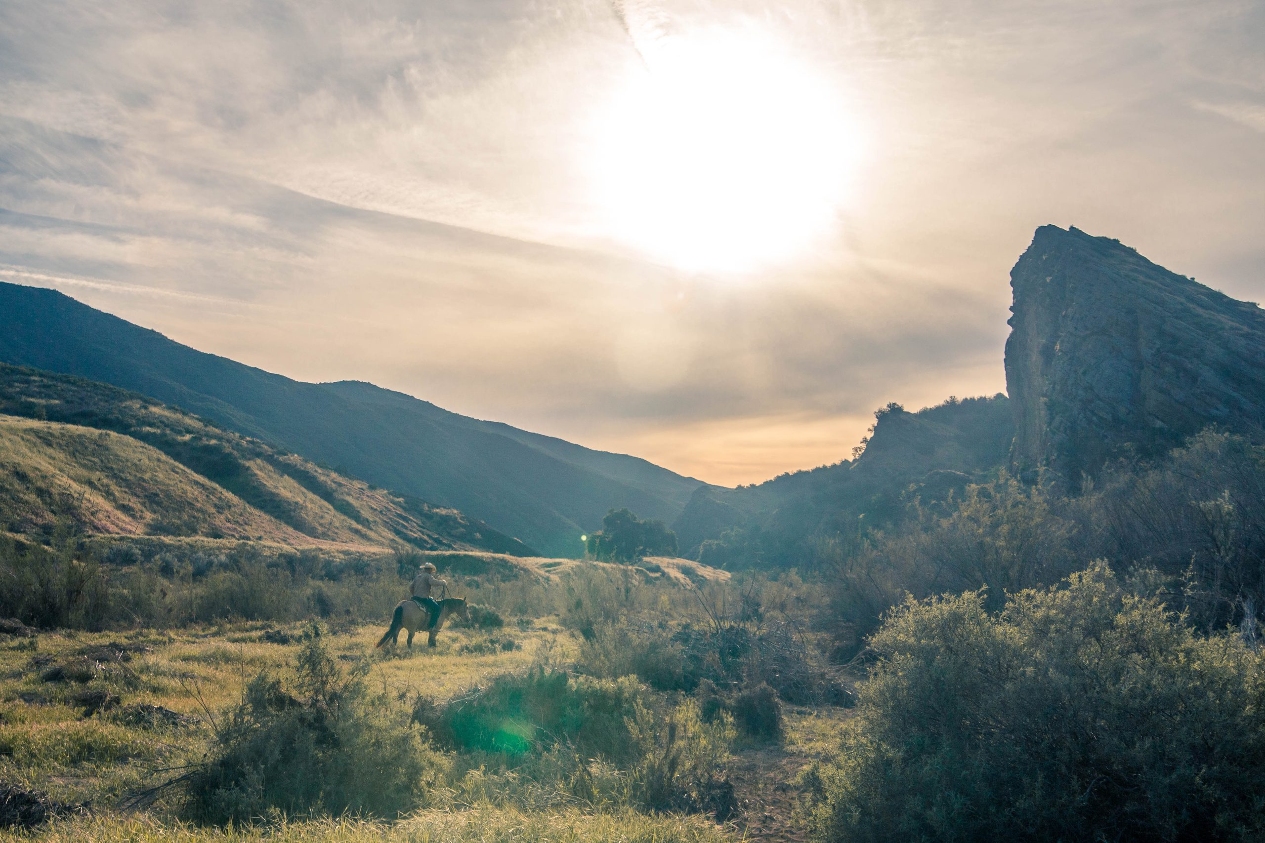 Horseback rider in California ranch country. Photograph by Jessica Kong.